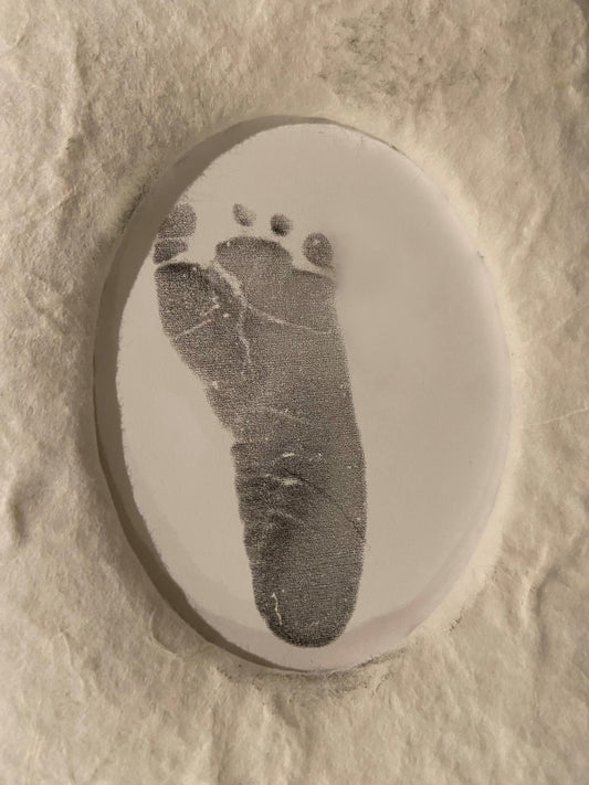 Travis Jr's. baby footprint